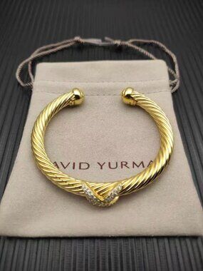 95% NEW David Yurman bracelet with a cross motif